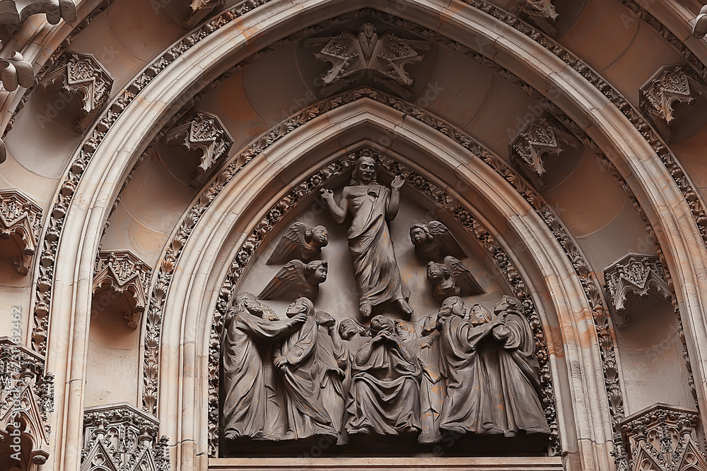 Obraz premium bas-relief on the cathedral in Prague / carving and decoration of the Catholic Cathedral in the Czechs
