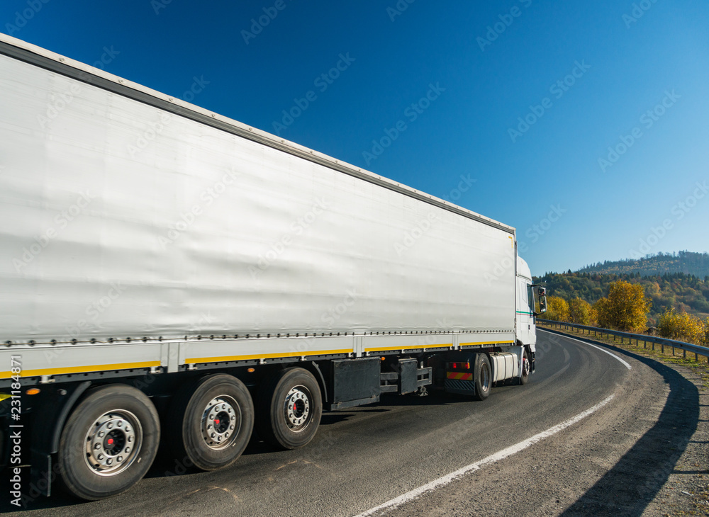 Truck in motion on road