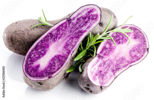 Vitolette noir or purple potato. On a white background. photo