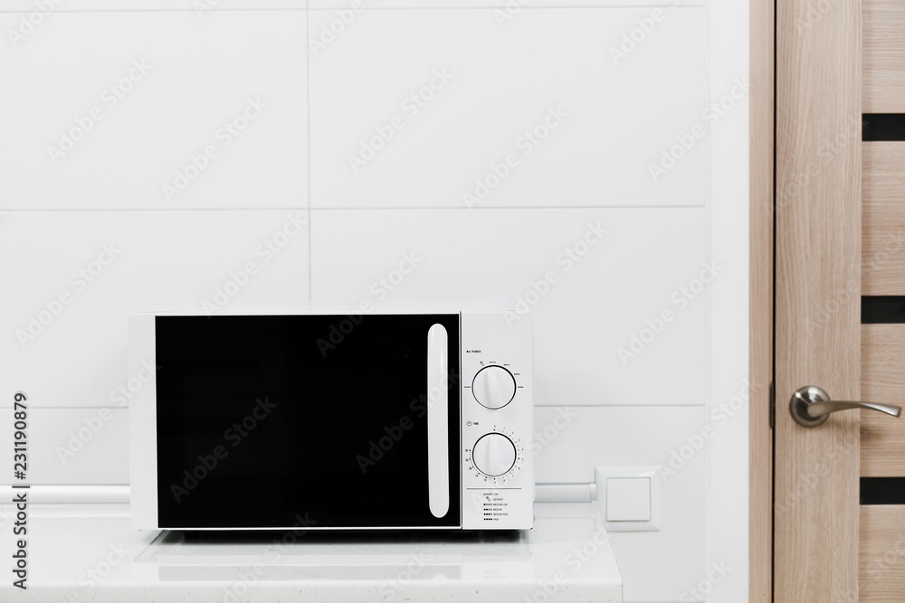 Fototapeta premium Modern kitchen interior with electric and microwave oven