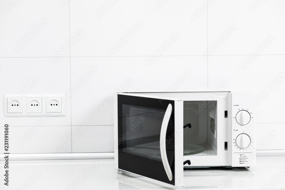 Fototapeta premium Modern kitchen interior with electric and microwave oven