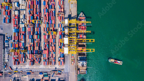 Aerial view of Deep seaport with cargo ships and containers