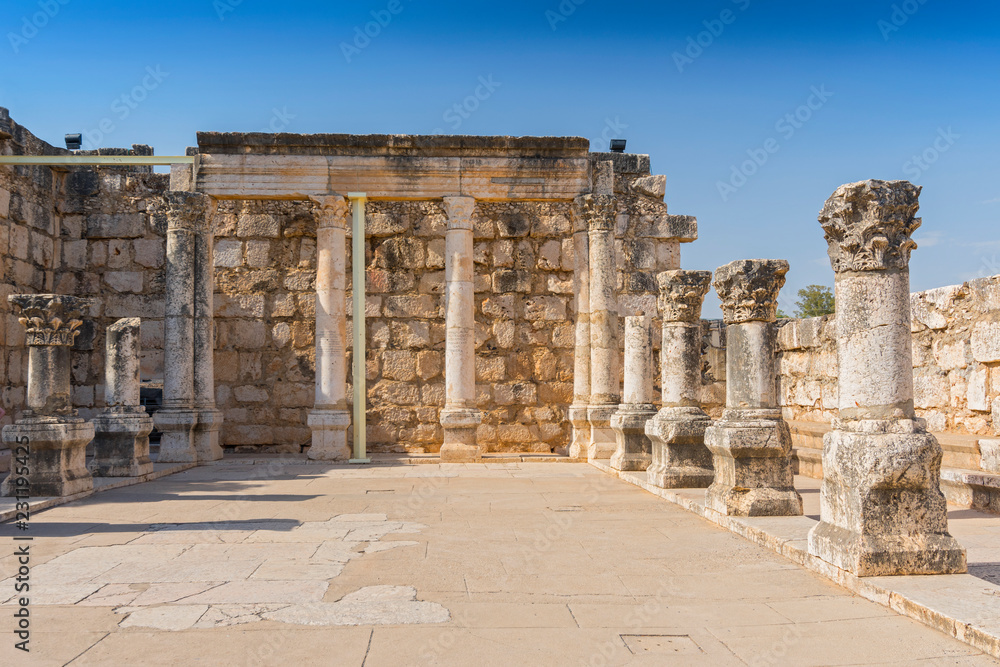 Ruins of the old synagogue in Capernaum by the Sea of Galilee, Israel.