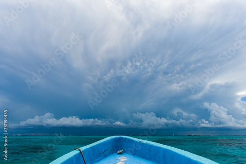 on a boat riding into the storm © Will