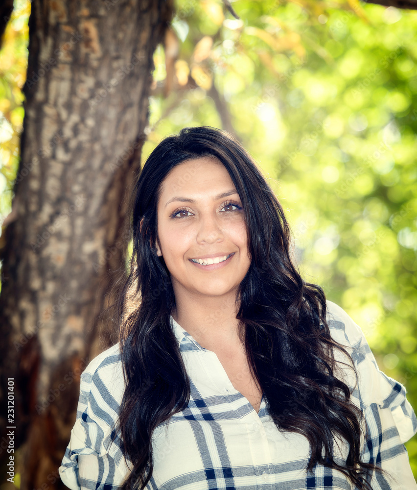 Beautiful Young Millennial Hispanic, American Indian, Multi-racial Woman Portrait Outside on a Fall Day Beautiful Young Millennial Hispanic, American Indian, Multi-racial Woman Portrait Outside on a Fall Day