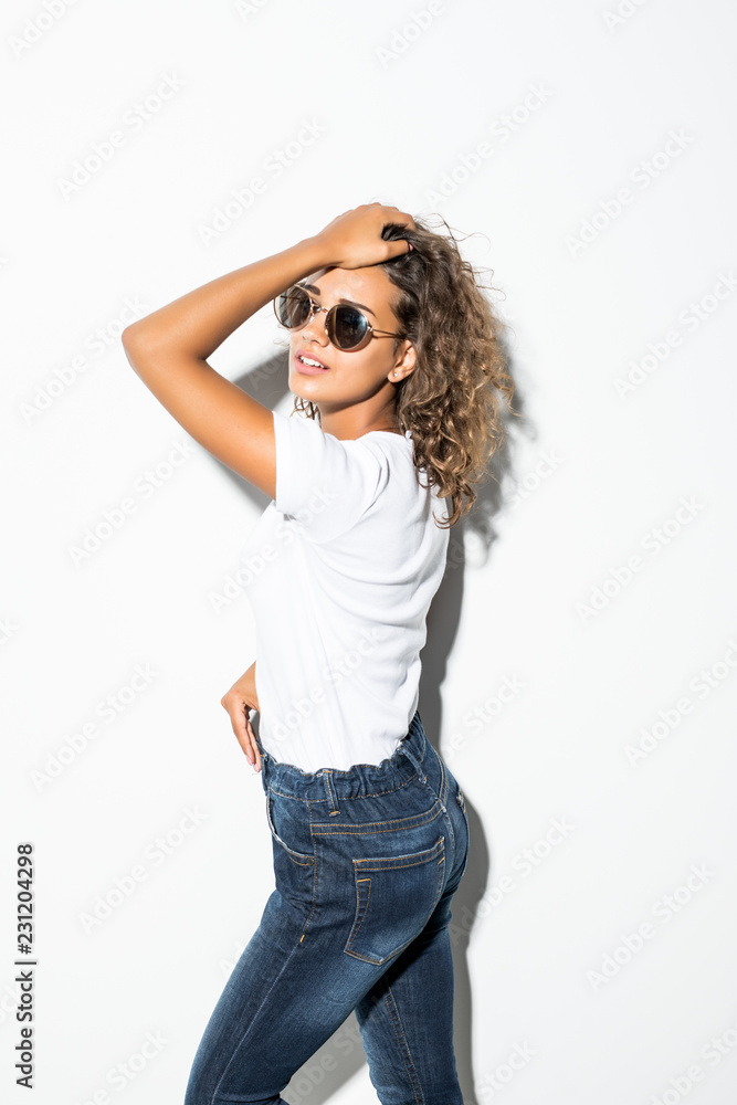 Portrait of attractive latin woman in sunglasses isolated on white background. Portrait of attractive latin woman in sunglasses isolated on white background.