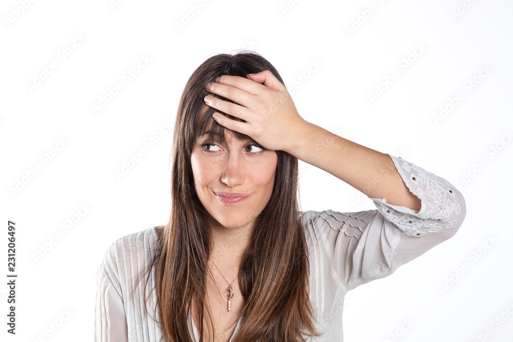 Portrait of confused young woman. Isolated on white background