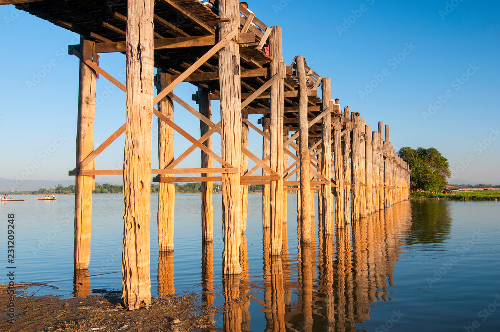 U Bein Bridge over the Taungthaman Lake, the oldest and longest teakwood bridge in the world Mandalay, Myanmar. U Bein Bridge over the Taungthaman Lake, the oldest and longest teakwood bridge in the world Mandalay, Myanmar.