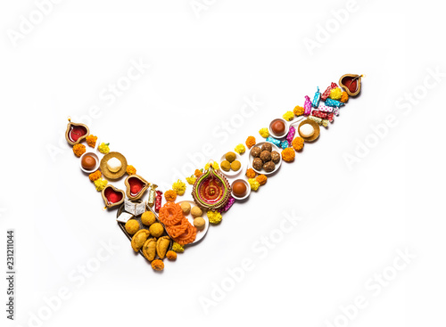 Wallpaper Mural Celebrate Green or Eco friendly Diwali concept showing food and diya arranged in a tick mark shape  Torontodigital.ca