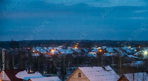 Russian Village n Winter Twilight. Russia Countryside In Night