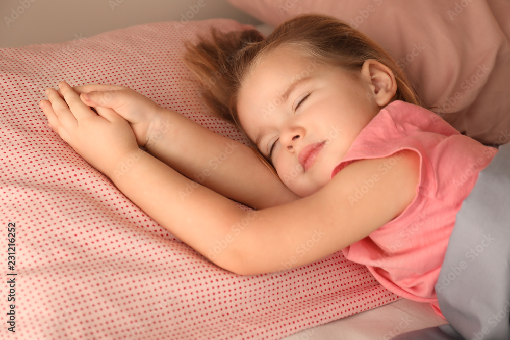 Cute little girl sleeping in bed at home Cute little girl sleeping in bed at home