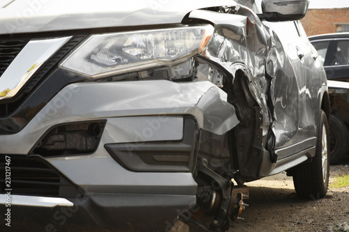 Broken car after road accident, closeup view. Auto insurance © New Africa