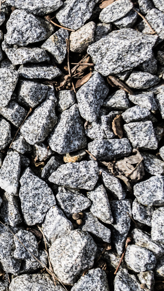 Fototapeta premium Smartphone HD wallpaper of Gravel stones texture