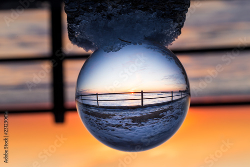 Crstal ball photoraphy of a winter scene in Lachine Quebec, Canada. photo