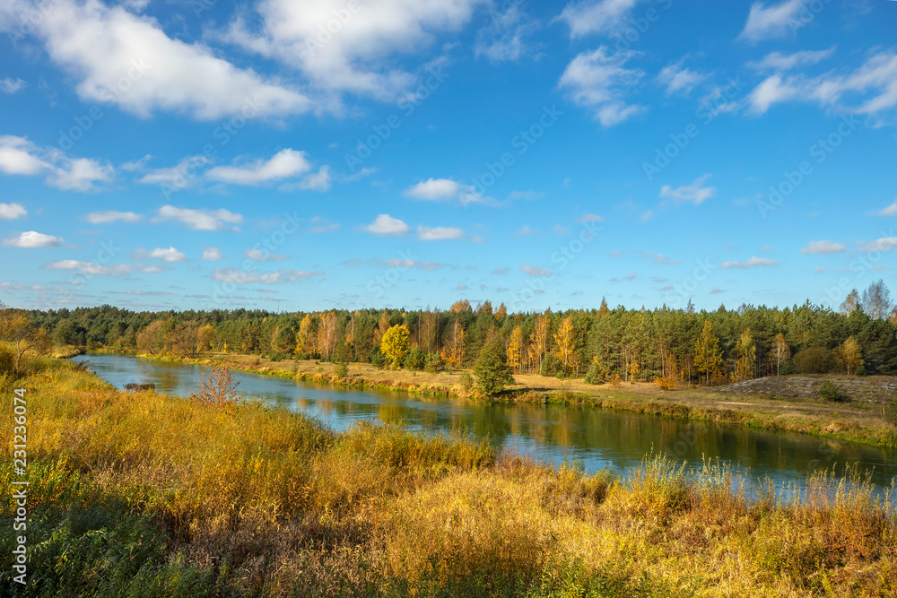 Autumn landscape with bright blue sky and river Autumn landscape with bright blue sky and river