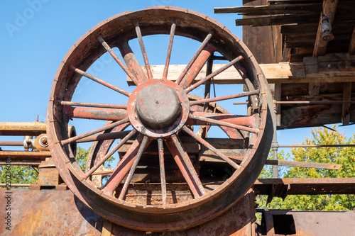 an old rusty machine belt wheel