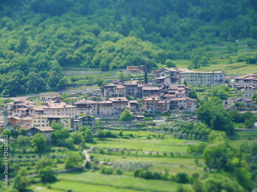 Tilt shift image of mountain village in italy