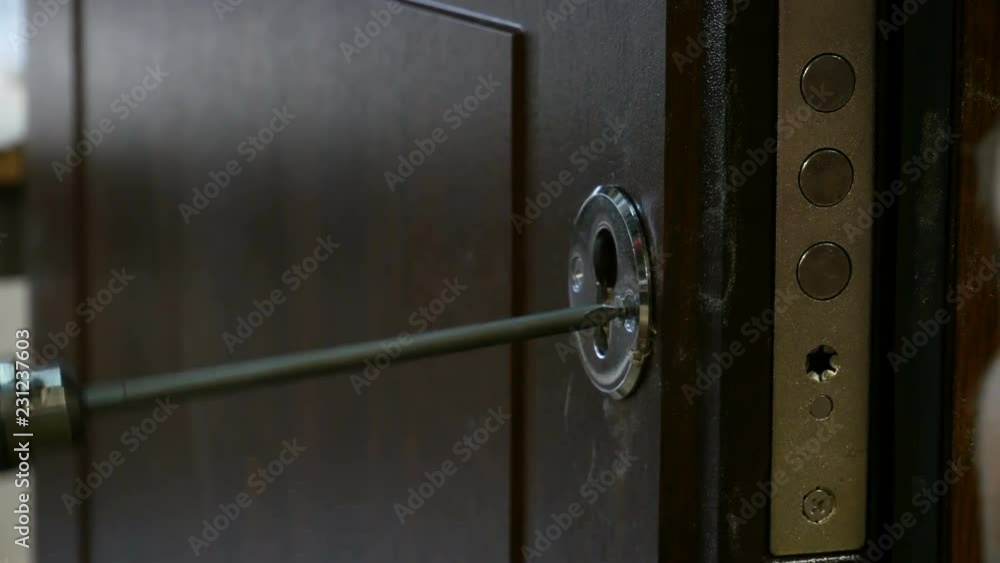 CLose up of Installation of the door lock. CLose up of Installation of the door lock.