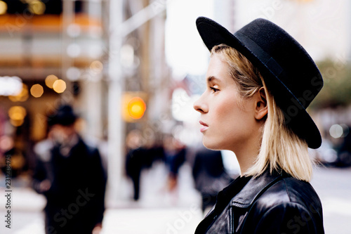 Portrait of young woman in black