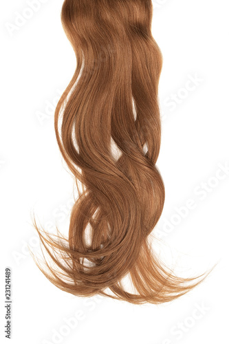 Bad hair day concept. Long, brown, disheveled ponytail