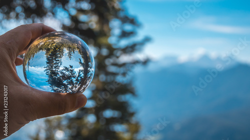 Crystal ball alpine landscape shot at the Kathrin summit - Bad Ischl - Salzburg - Austria photo