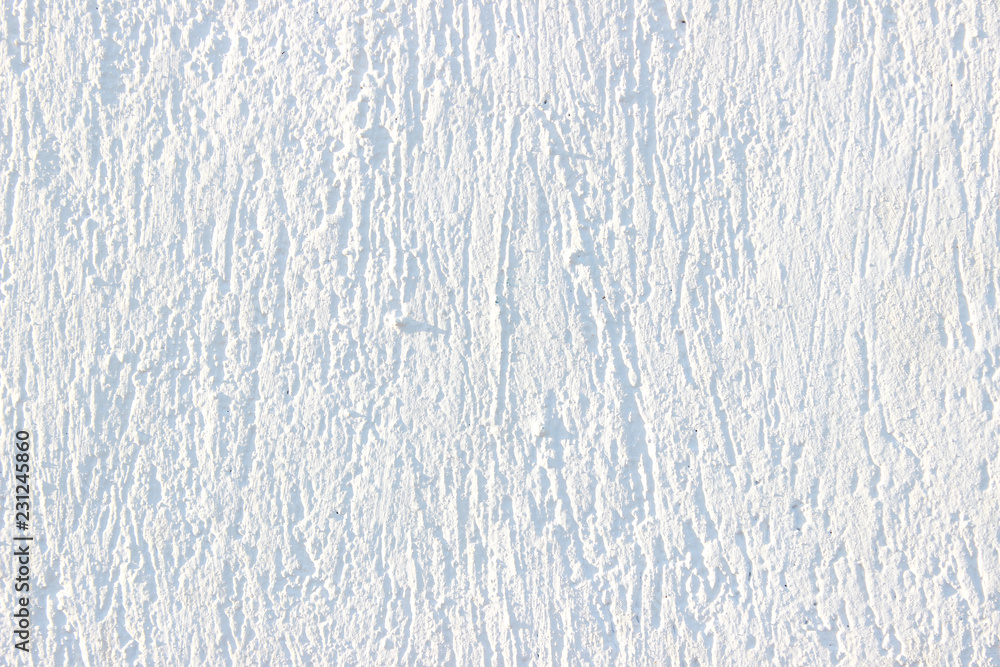 White textured stucco wall detail close up backdrop White textured stucco wall detail close up backdrop