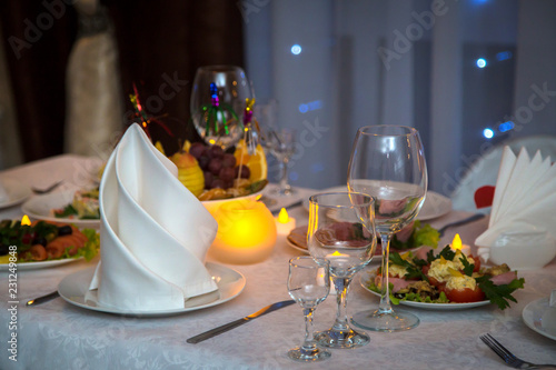 A beautiful decorated table with snacks and glasses