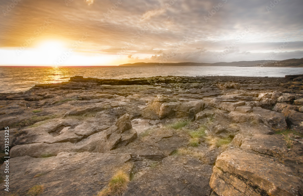 Anglesey landscape.Stunning sunrise scene over rocky coastline of North Wales.