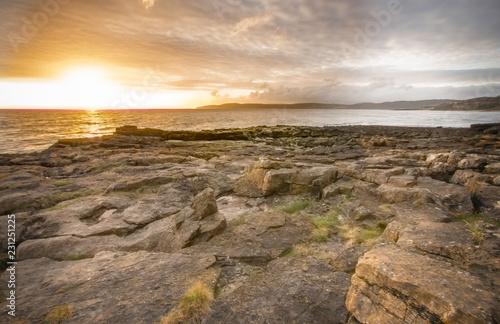 Anglesey landscape.Stunning sunrise scene over rocky coastline of North Wales.