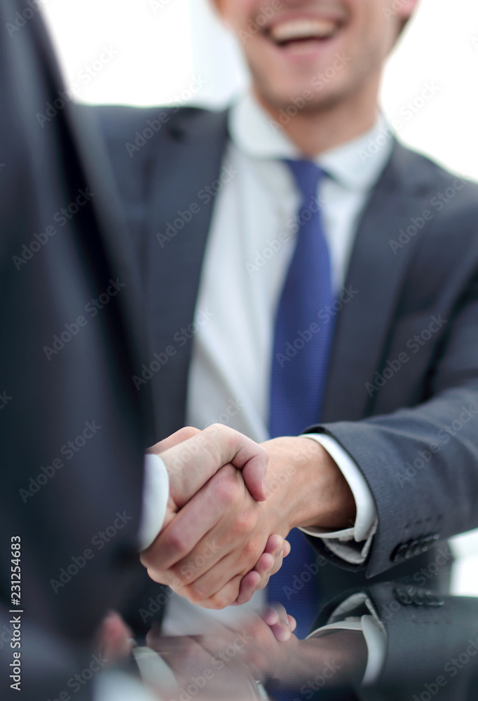 vertical photo.handshake business people .