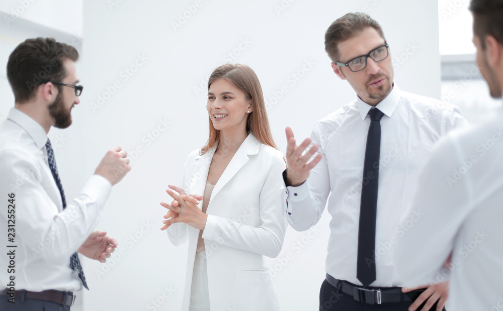 employees of the company discussing a new commercial project employees of the company discussing a new commercial project