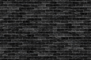 Acrylglasbilder Ziegelmuster Dunkle schwarze Ziegelmauer mit Textur  © stockphoto-graf