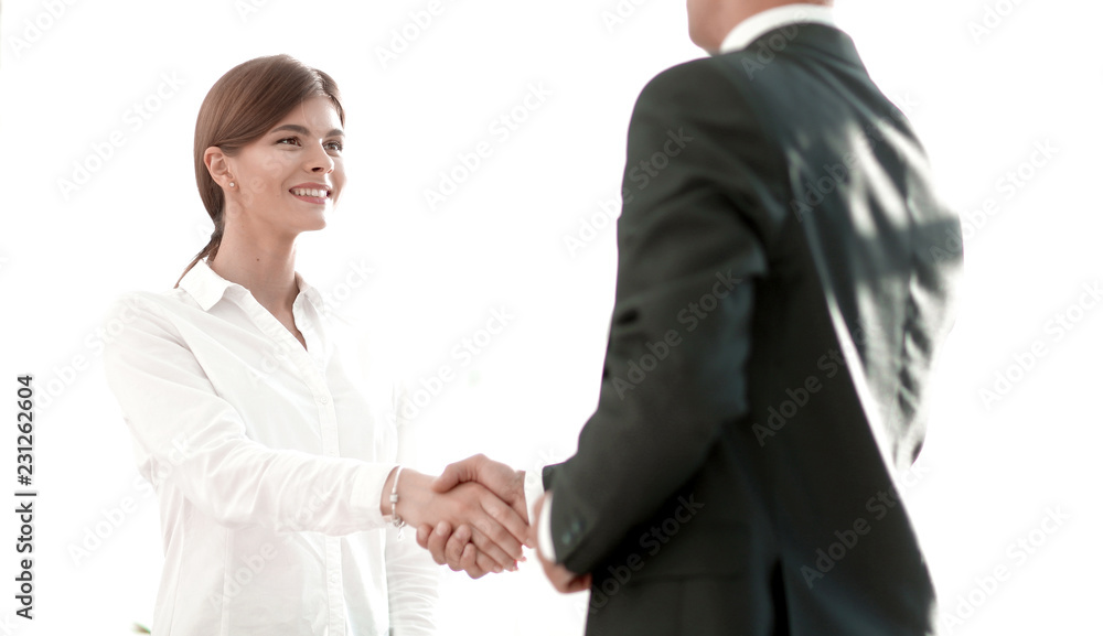 handshake young business woman with a colleague handshake young business woman with a colleague
