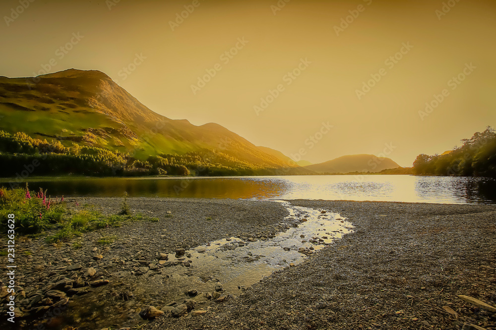 Golden sunset over mountain lake in Buttermere, Lake District,Cumbria,Uk