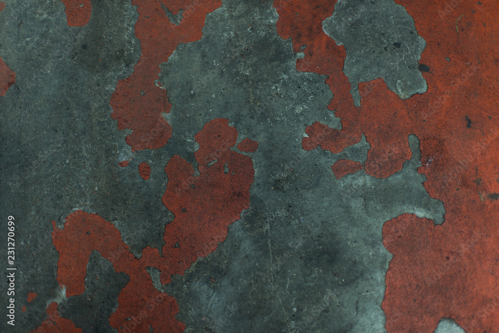 A grungy old painted concrete texture in gray and red color