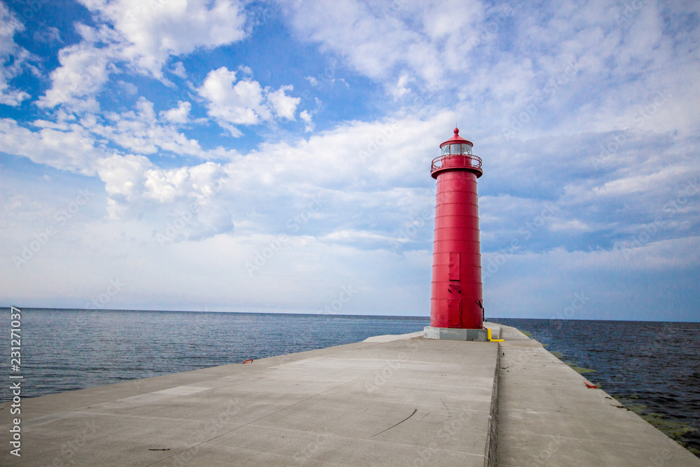 Lighthouse Background With Copy Space. Grand Haven Michigan lighthouse on a sunny day along the coast of Lake Michigan.