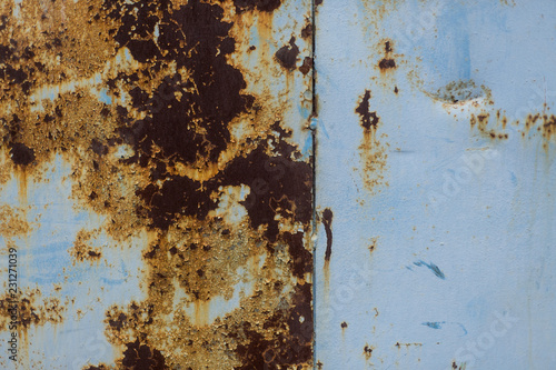 Texture of old blue rusted metal plate. Dirty and ground, can be use for design © Aleksander
