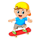 happy boy playing skateboard