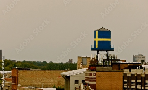 Andersonville Chicago neighborhood Icon flag water tower was replaced with a replica when the original was damaged by a harsh winter. The area was once populated by Swedish farmers.