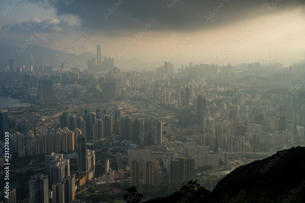 Hazy sunset in hong kong, view of the harbor and city. Victoria Peak Hazy sunset in hong kong, view of the harbor and city. Victoria Peak