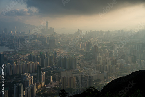 Hazy sunset in hong kong, view of the harbor and city. Victoria Peak