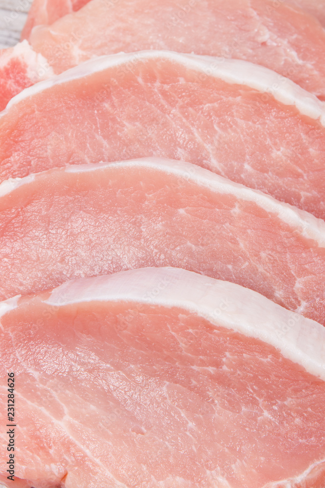 Raw meat pork steaks containing protein for lunch or dinner Raw meat pork steaks containing protein for lunch or dinner