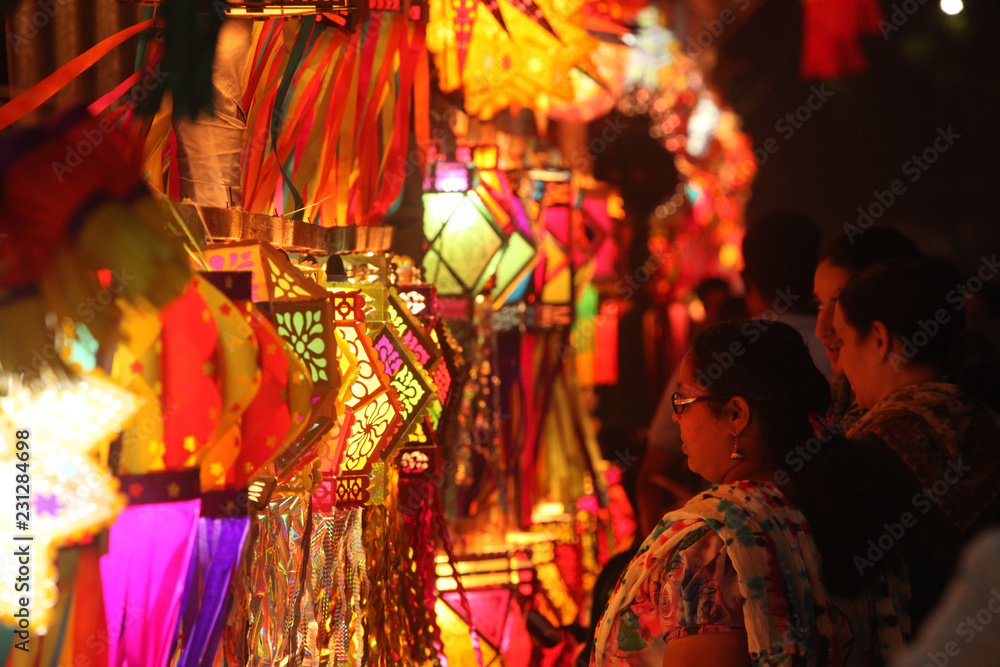 Pune, India - November 2018: Indian people shopping for traditional lanterns for the Diwali festival in India.