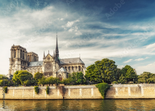 Notre Dame Cathedral in Paris, France, at daytime. Summer travel background.