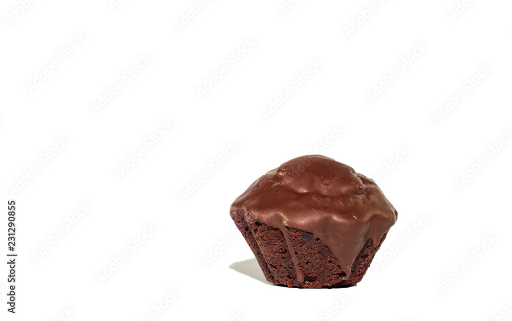 Single chocolate black cupcake coated in chocolate isolated on white background Single chocolate black cupcake coated in chocolate isolated on white background