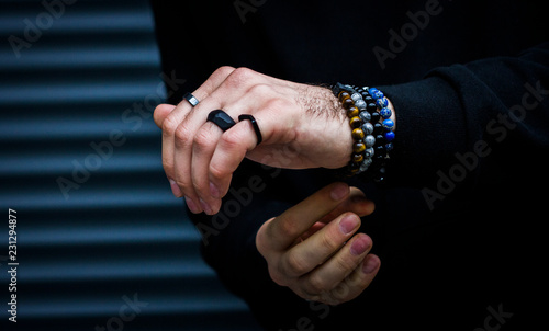 Fotografia, Obraz Men's bracelet on hand