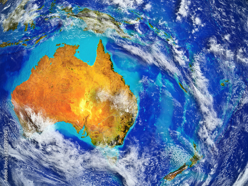 Australia on realistic model of planet Earth with country borders and very detailed planet surface and clouds.