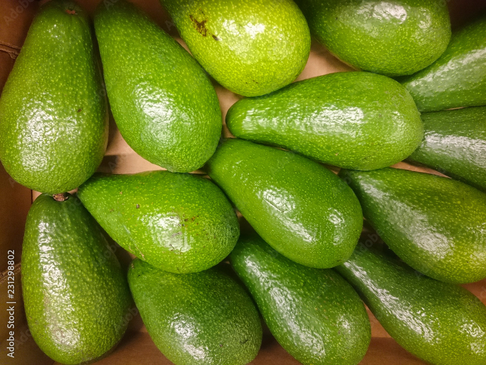 Beautiful and fresh avocado on a shelf in a supermarket. Beautiful and fresh avocado on a shelf in a supermarket.