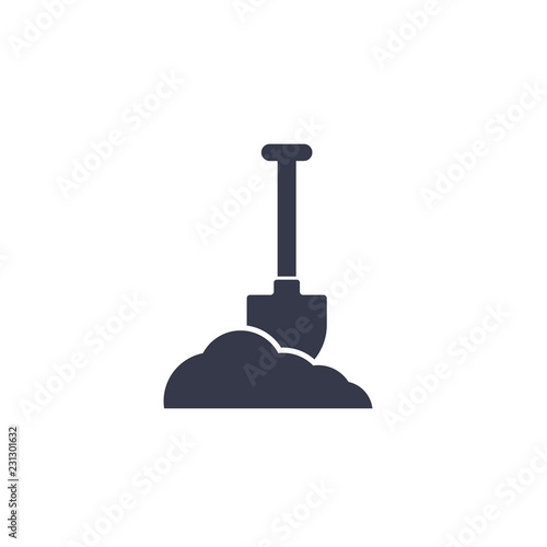 Shovel in dirt vector icon on white
