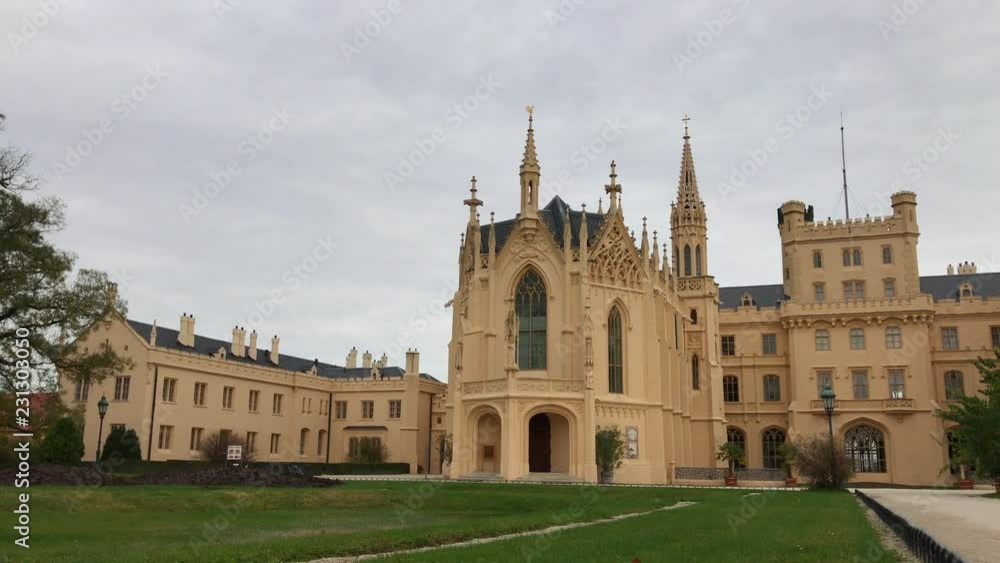 Lednice Castle, South Moravia, Czech Republic in autumn day, cloudy weather. Czechia castle in UNESCO world heritage list. Chateau, park and garden near Lednice palace. Romantic neo-gothic mansion Lednice Castle, South Moravia, Czech Republic in autumn day, cloudy weather. Czechia castle in UNESCO world heritage list. Chateau, park and garden near Lednice palace. Romantic neo-gothic mansion